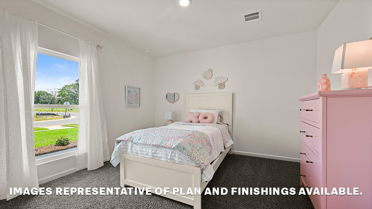 Bedroom 2 showcases space via single door closet, window, convenient home access to multi-use spaces Zachary Trails