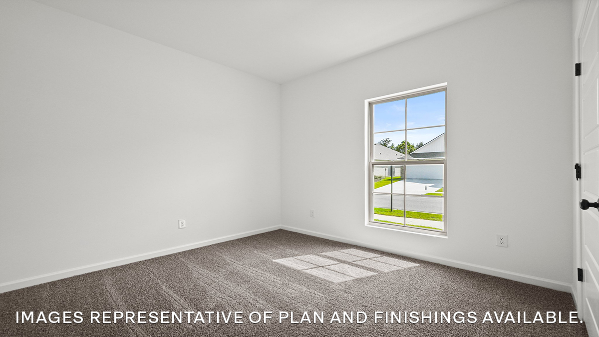 fourth bedroom with window and room for full or queen bed