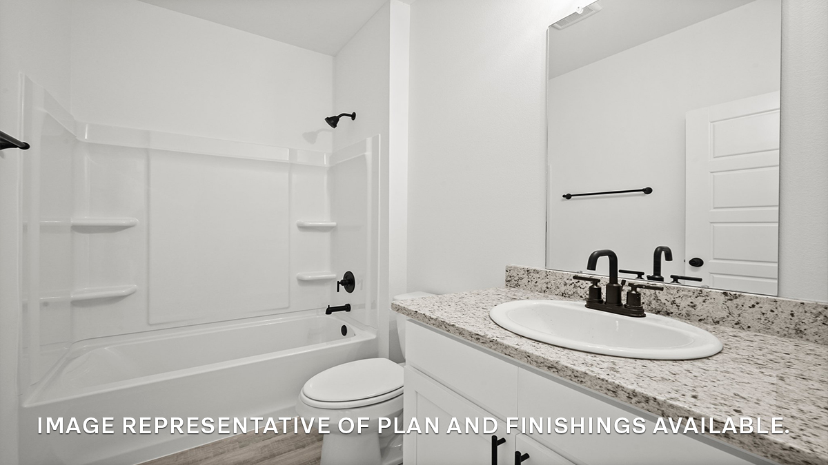 third bathroom with single vanity and toilet and shower tub combo