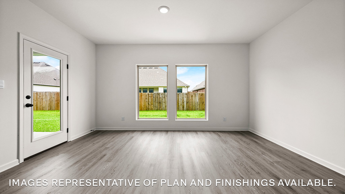 open-concept dining room with patio access