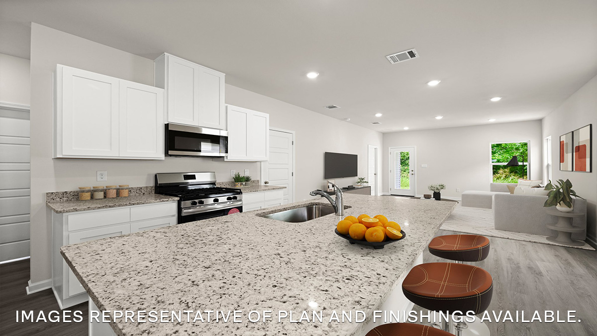 white kitchen island cabinets with stainless steel appliances and stools and access to dining room