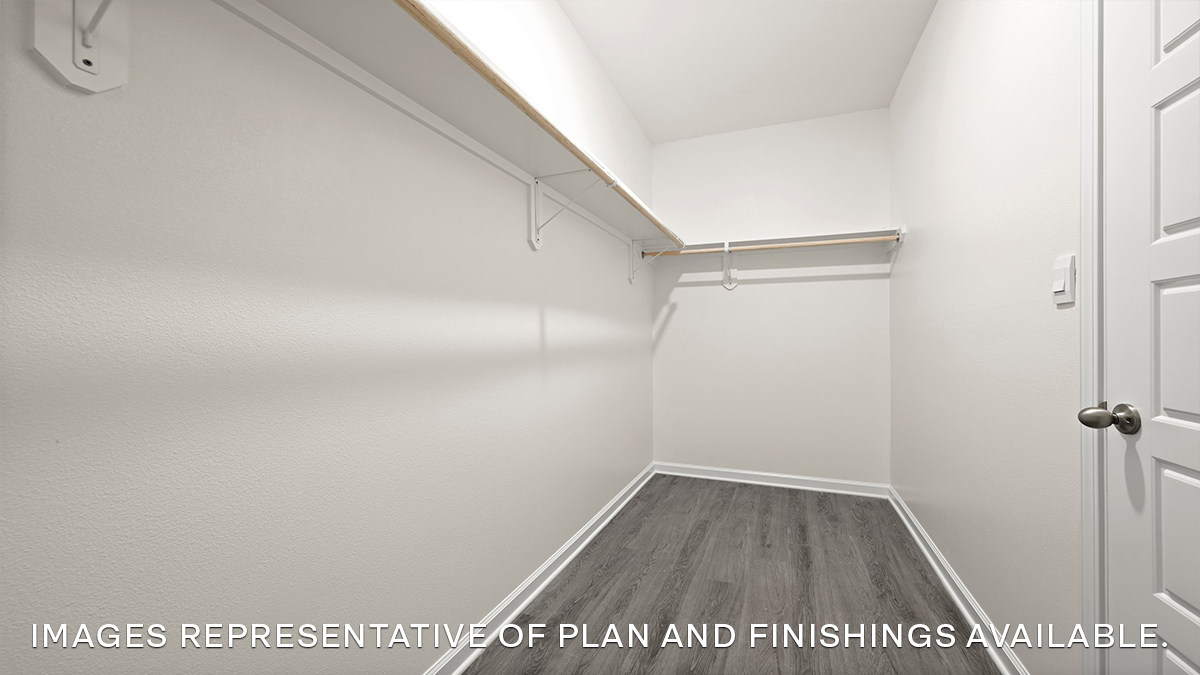 primary bedroom walk-in closet