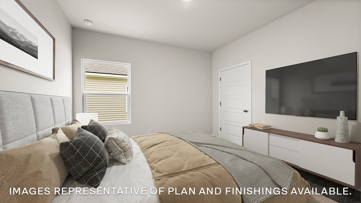 second bedroom with single window and room for a queen bed