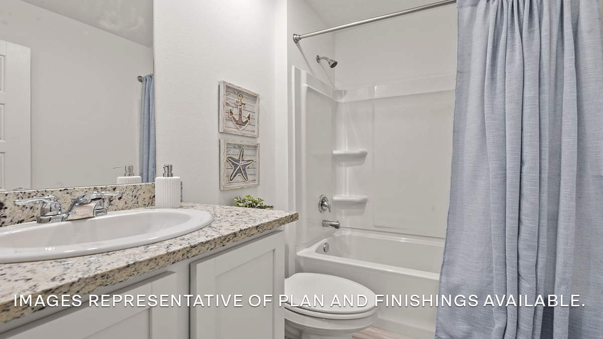 Guest bathroom with single vanity mirror and shower tub combo