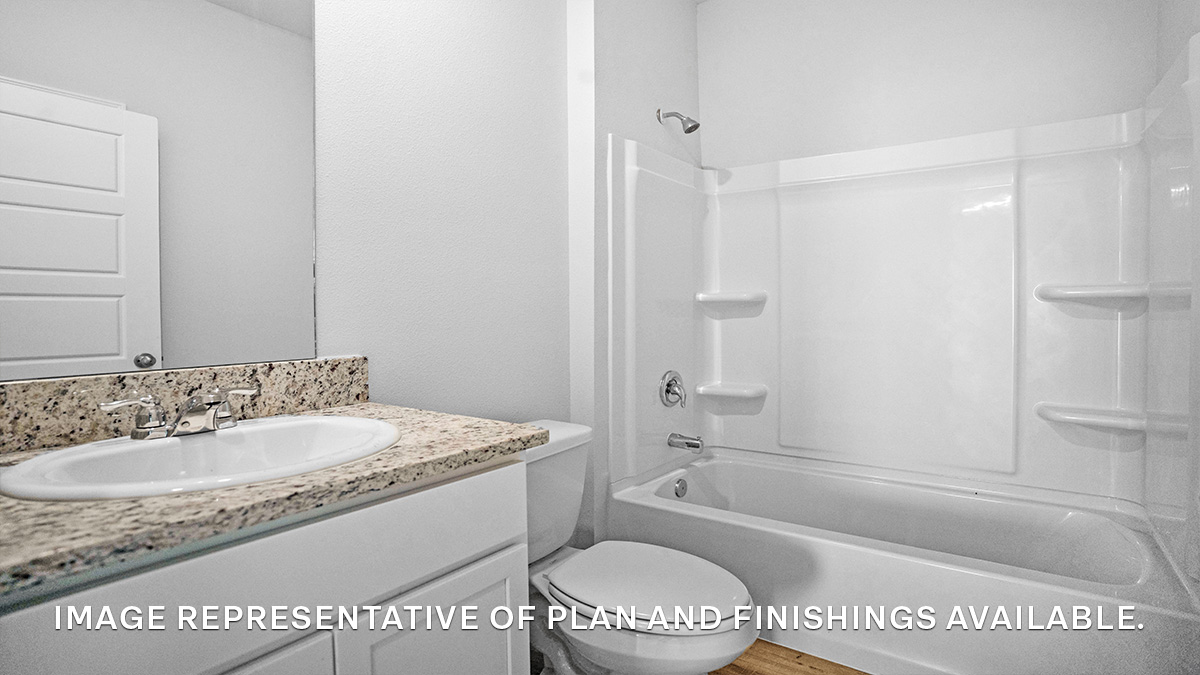 Guest bathroom with single vanity mirror and shower tub combo
