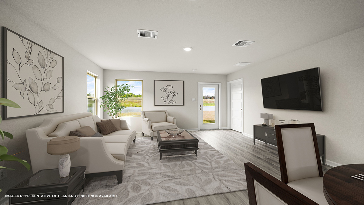 Open-concept living room with backyard access