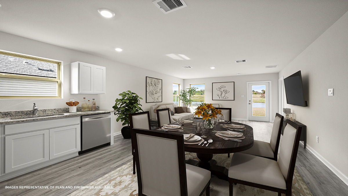 Open-concept living room with dual windows facing front of the home