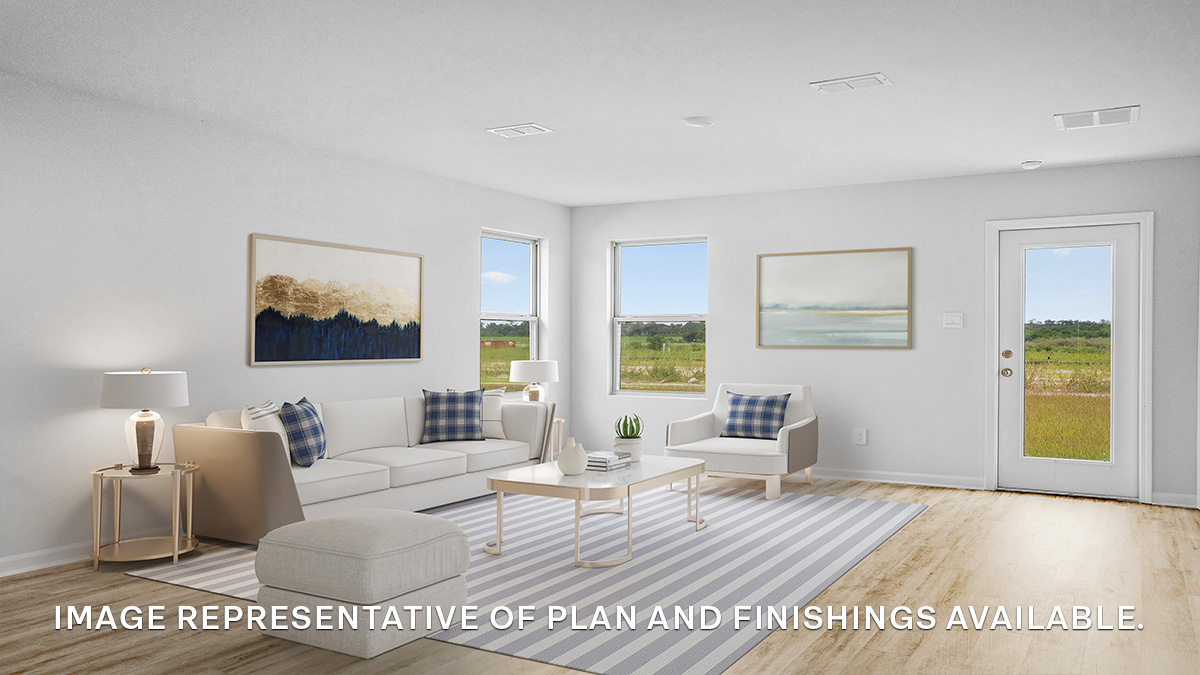 Open-concept living room with backyard access