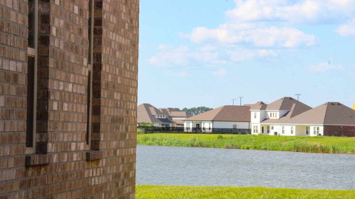 View of backyard with lake