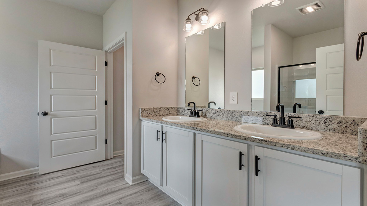 Dual vanities in primary bathroom