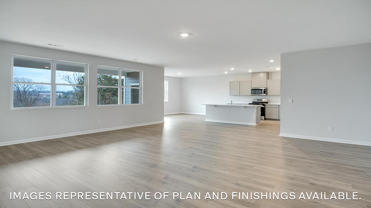 open concept living room near kitchen