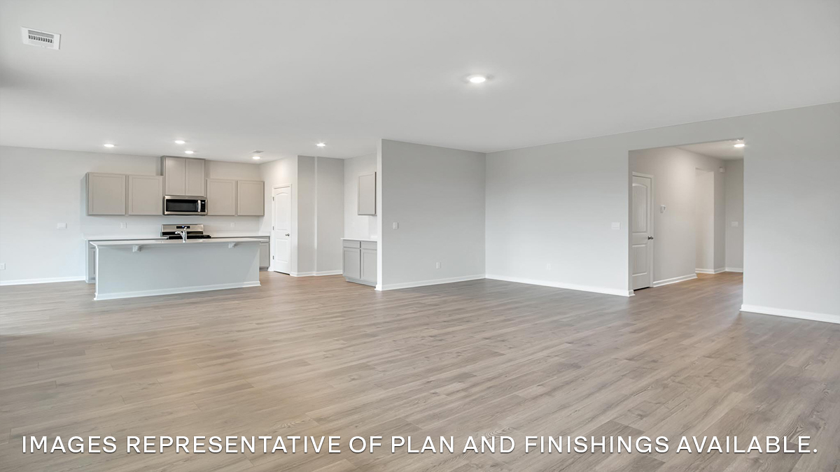 open concept living room near kitchen