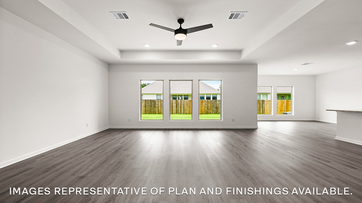 open-concept living room with access to kitchen and dining space