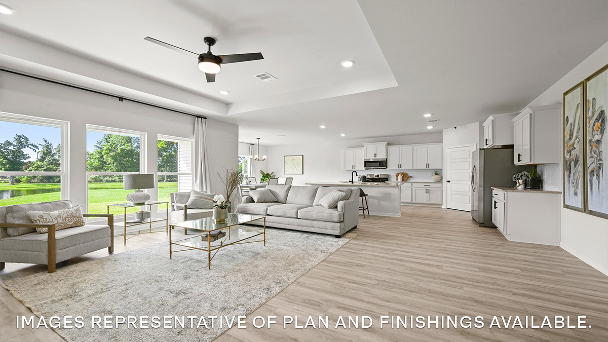 open-concept living room with access to kitchen and dining space