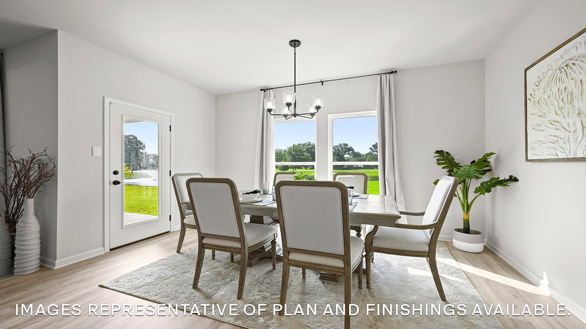 open-concept dining room with patio access