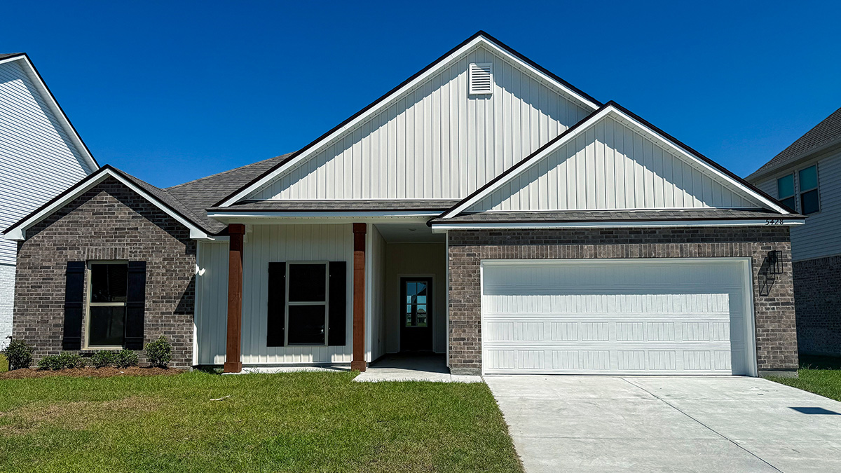 single-story homw with grey brick and white vinyl siding with large porch and two0car garage