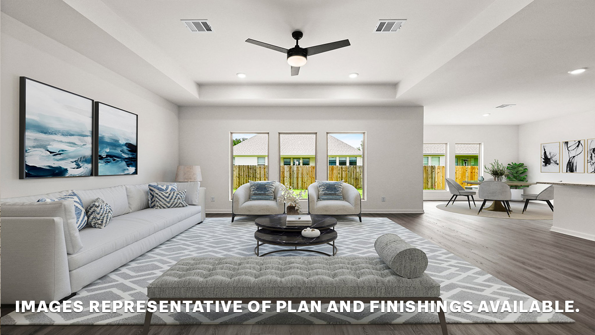 open-concept living room with access to kitchen and dining space