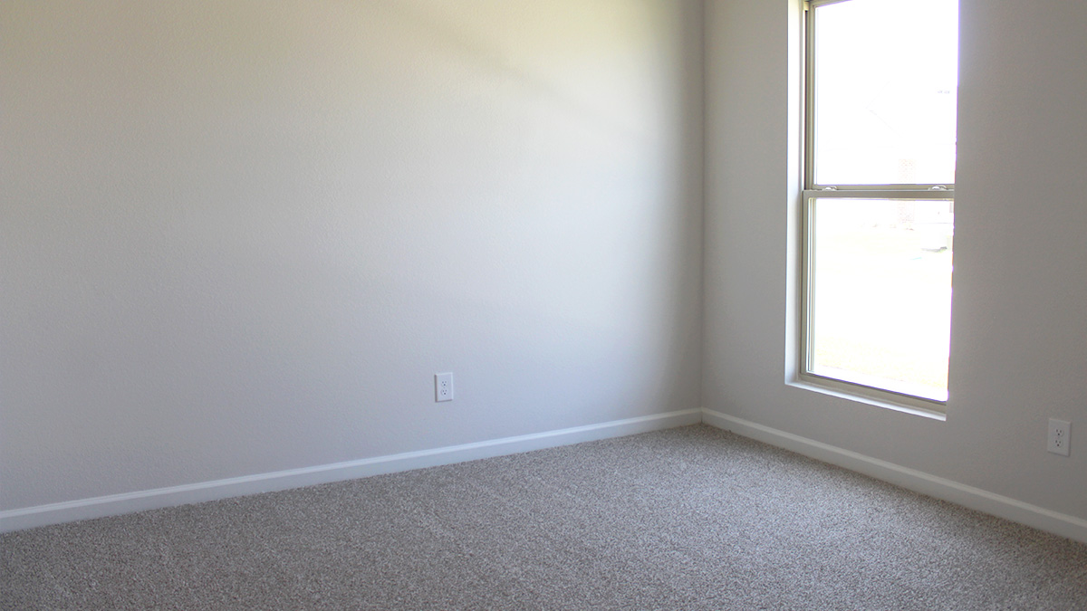 Third bedroom with window and space for queen bedroom set
