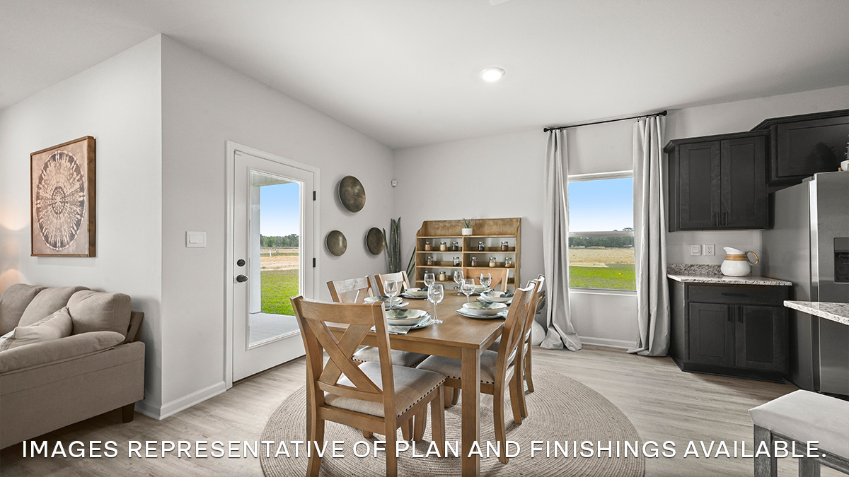 open dining space with access to patio