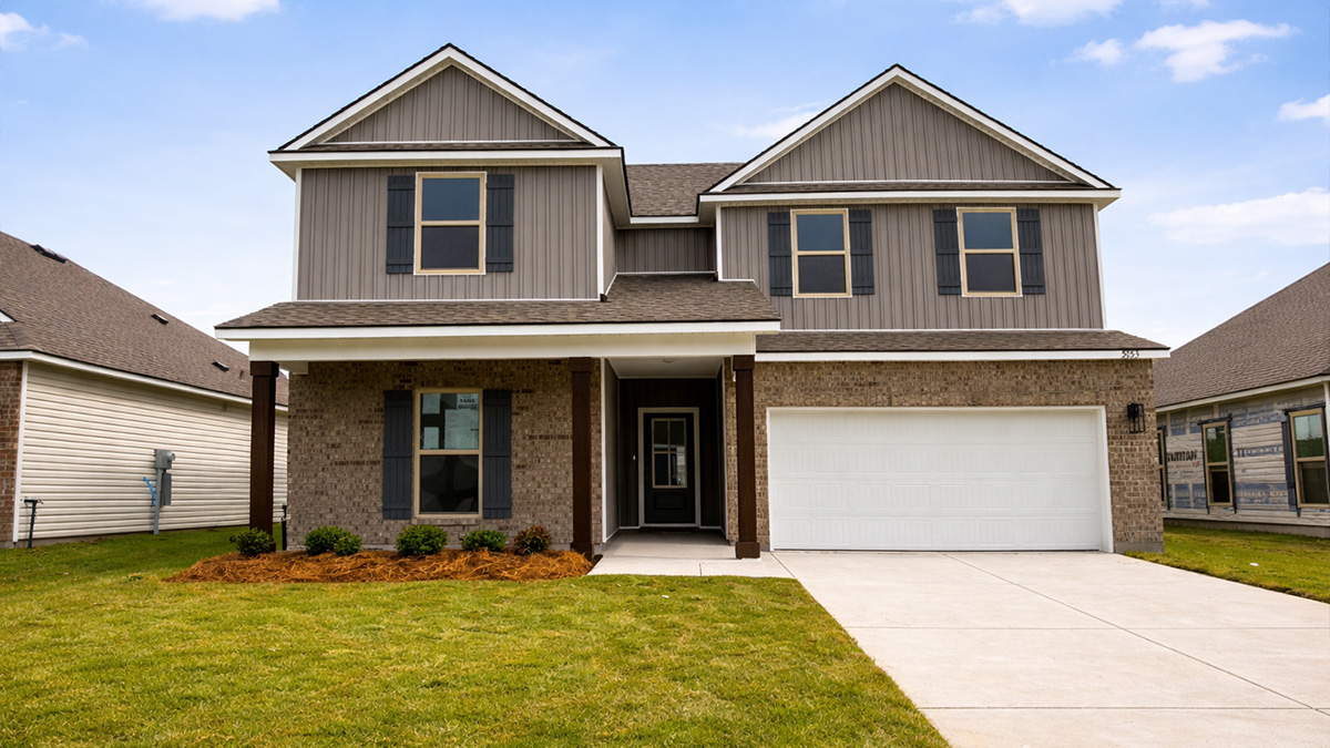 double-story home with gray brick and gray vinyl siding with porch and two-car garage