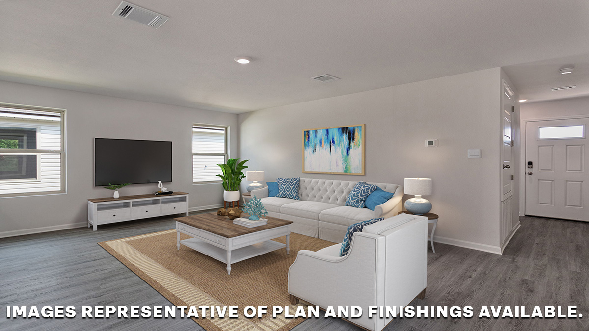 Open concept living space with hall to bedrooms