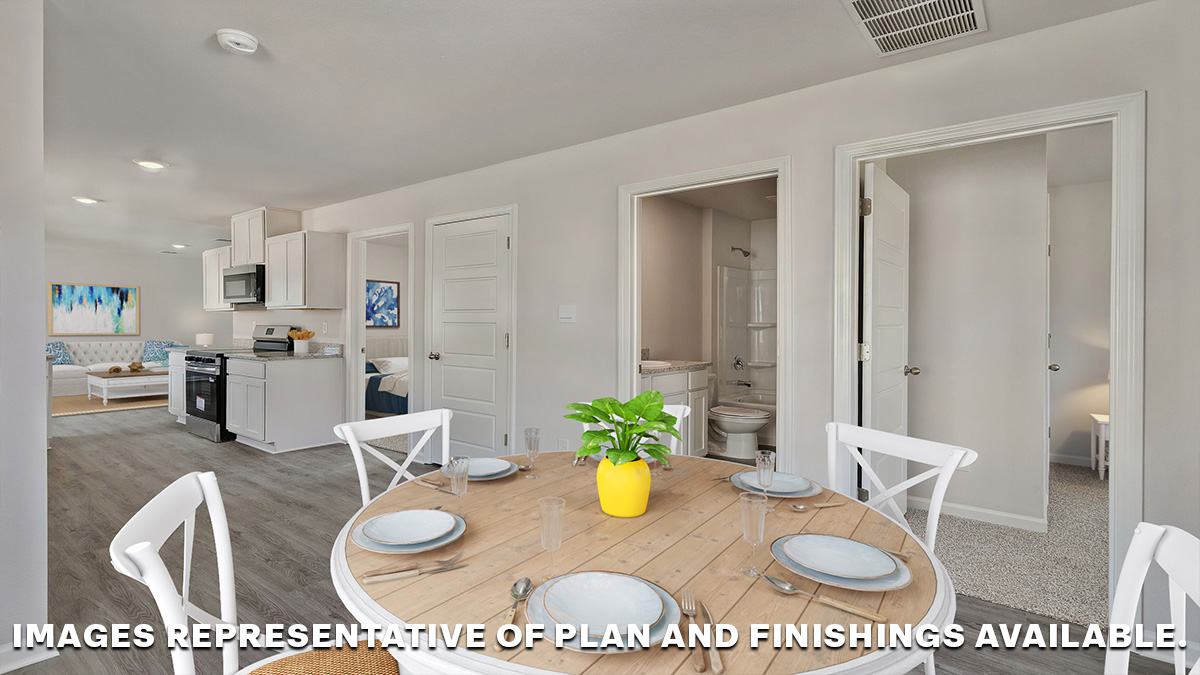 Dining space with primary bedroom nearby and full bathroom