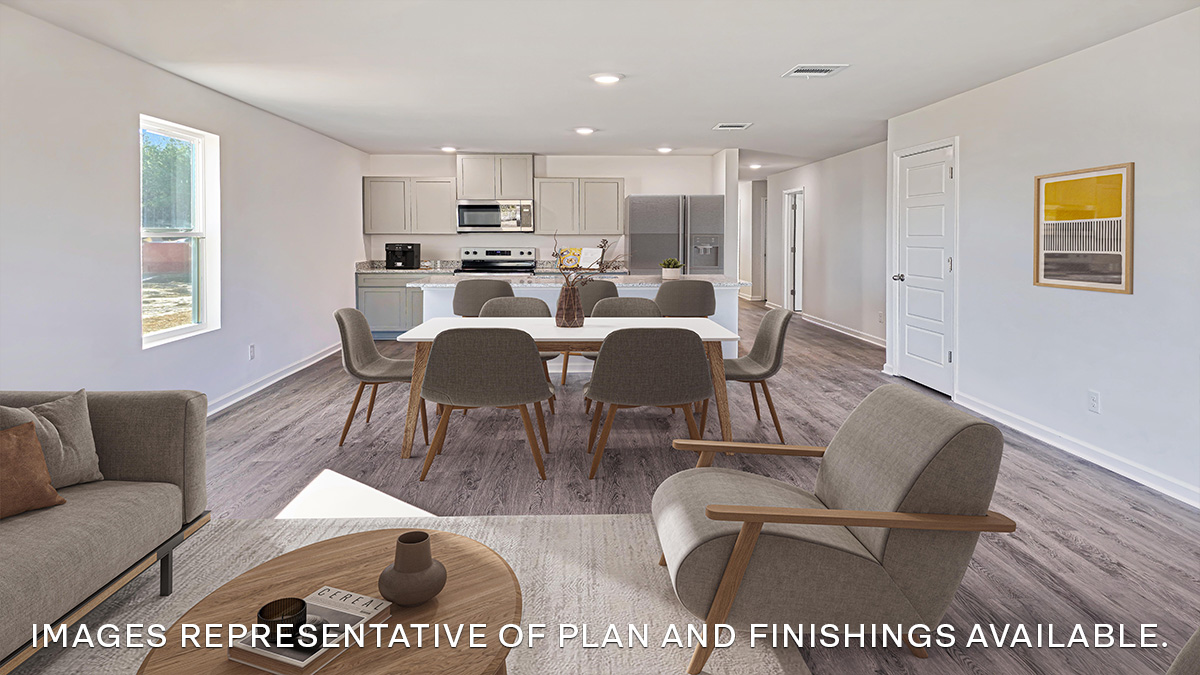 open concept living space with kitchen in the rear with gray kitchen island