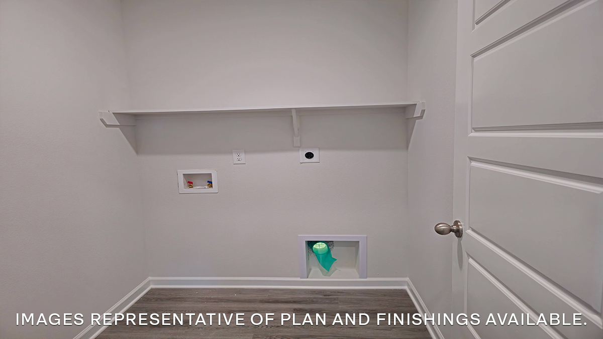 laundry room with space for large appliances near kitchen