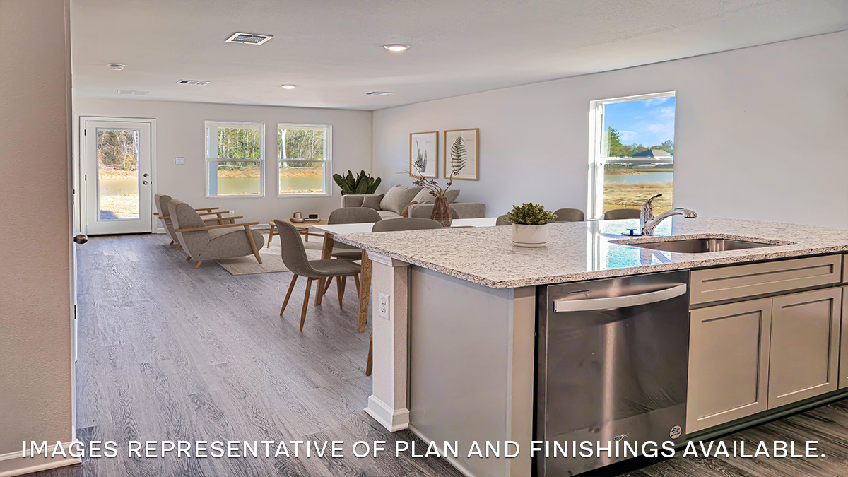 gray kitchen island with stainless steel appliances