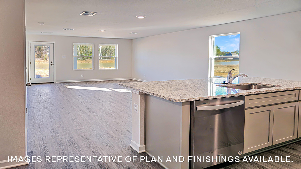 gray kitchen island with stainless steel appliances