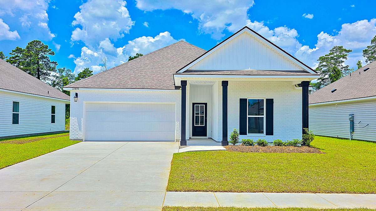 single-story home with white brick and white vinyl with black front door and shutters with porch and two-car garage