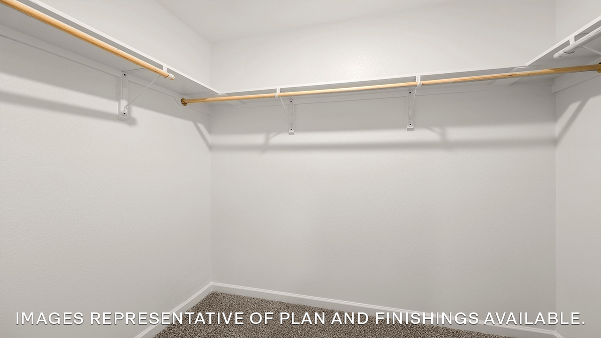 walk-in closet in primary bedroom