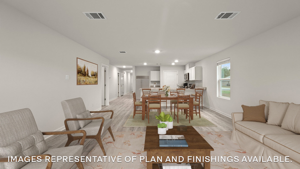 spacious living room with single side-view window with kitchen and dining space in the rear