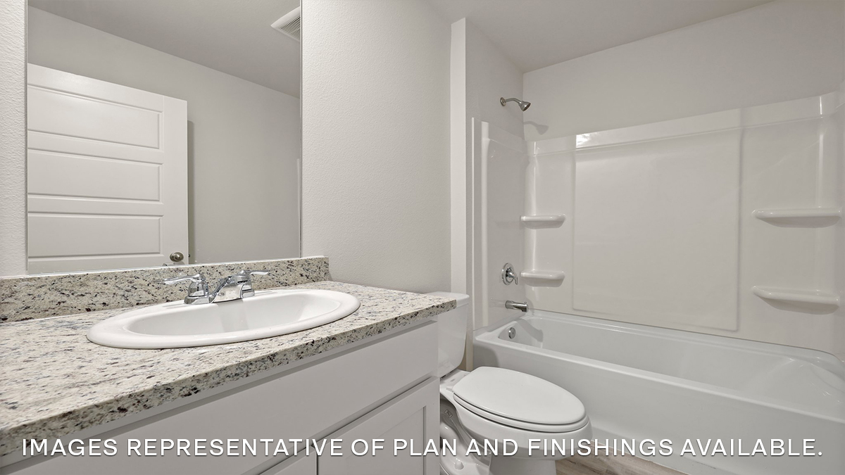 guest bathroom with single vanity, toilet and shower, tub combo