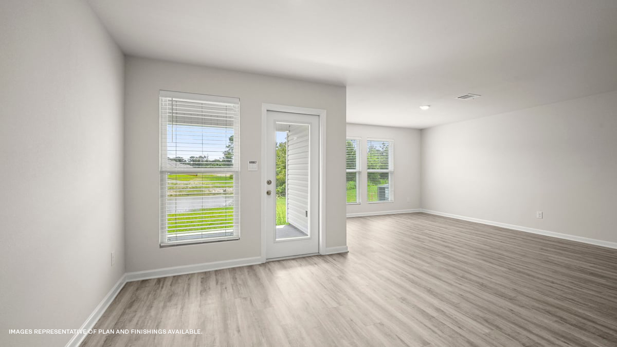 Dining and living room with access to the patio