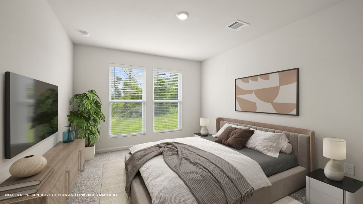 primary bedroom with room for a king-sized bed and two panel window
