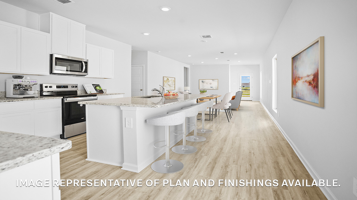 White kitchen island with stainless steel appliances and stools and open-concept living and dining
