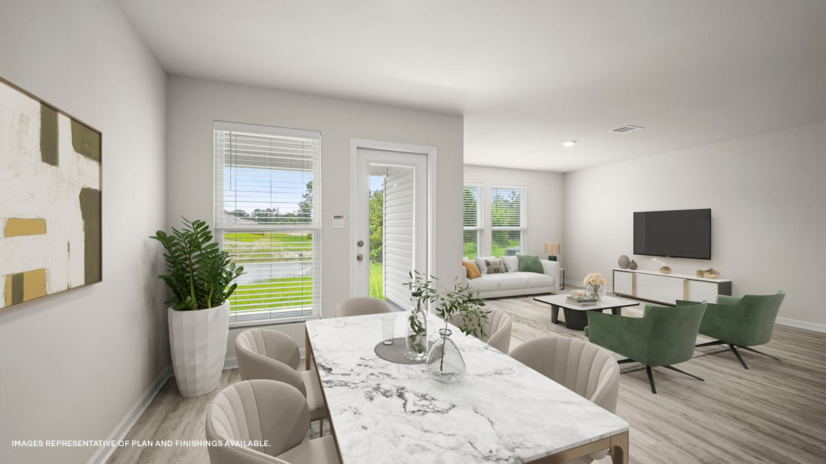 Dining and living room with access to the patio