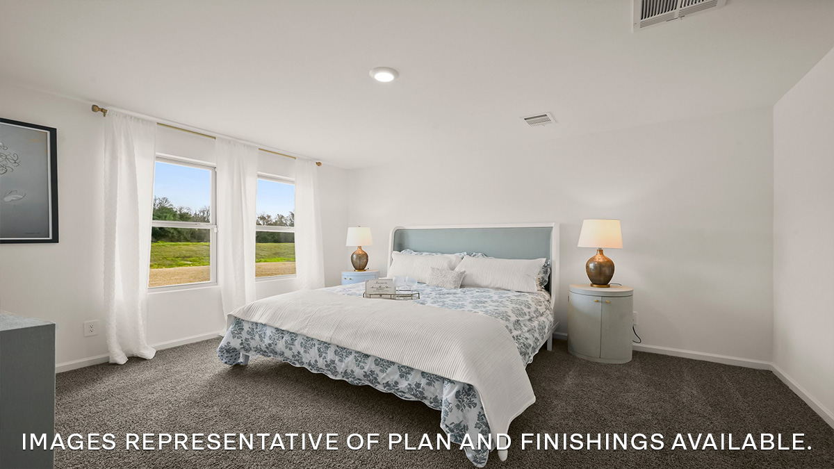 primary bedroom with room for a king-sized bed and rear facing window