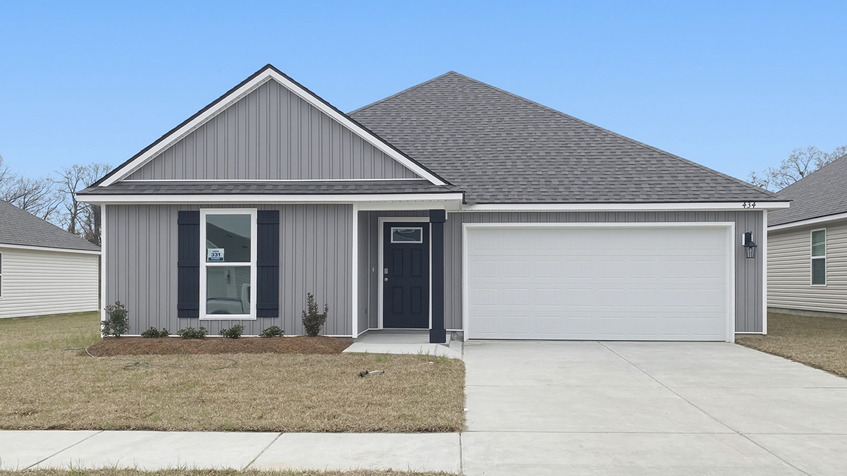 single-story home with gray vinyl siding with black front door and shutters with two-car garage