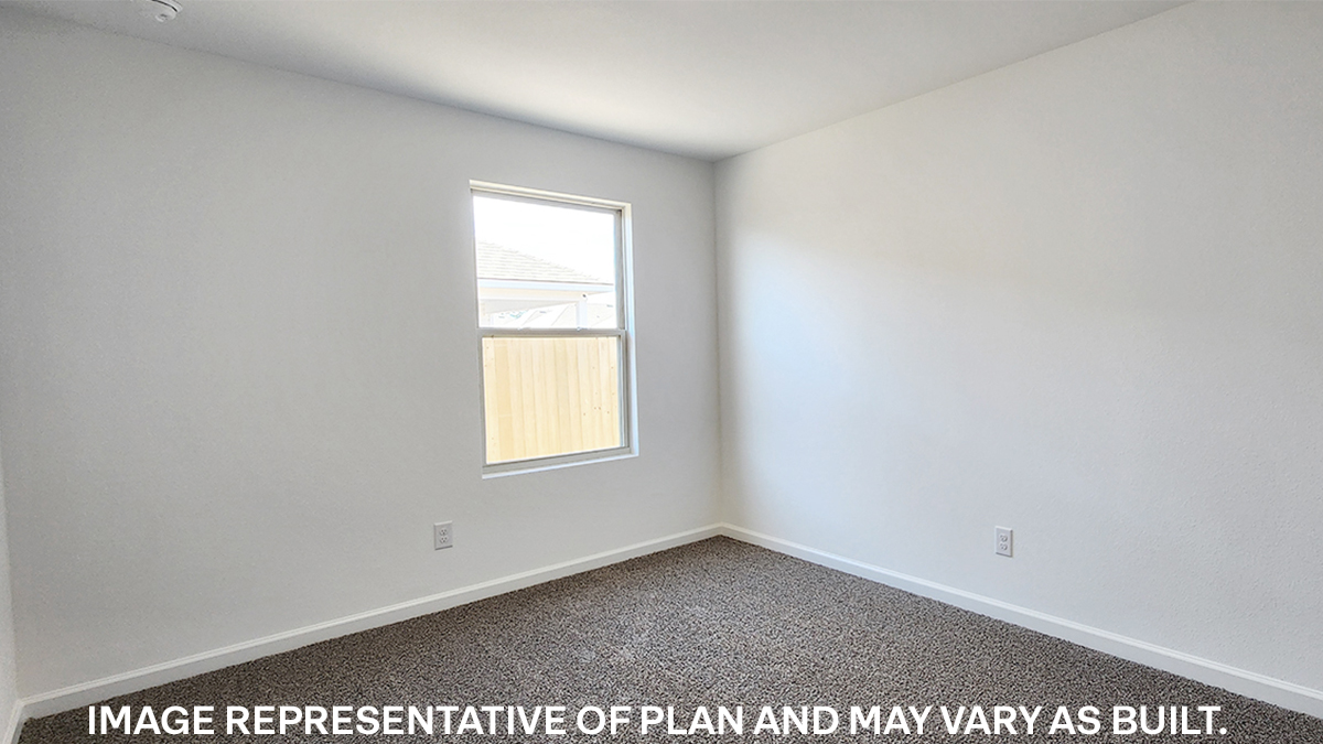 second bedroom with dual windows and room for a queen bed