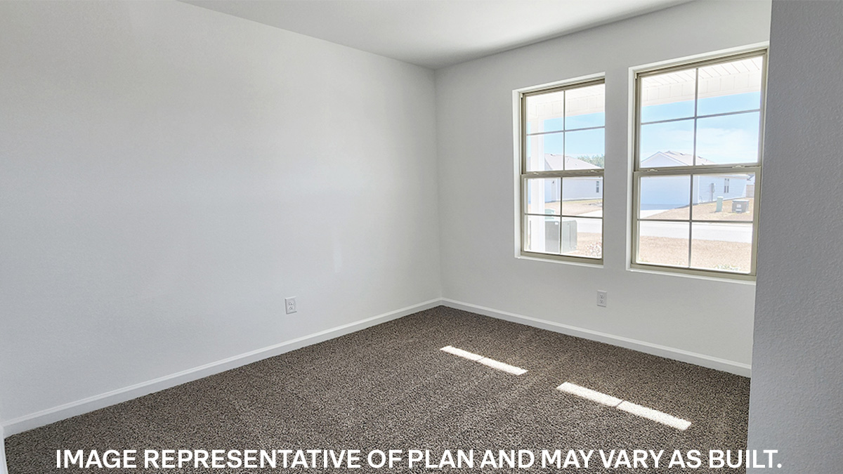 fourth bedroom with window and room for full or queen bed