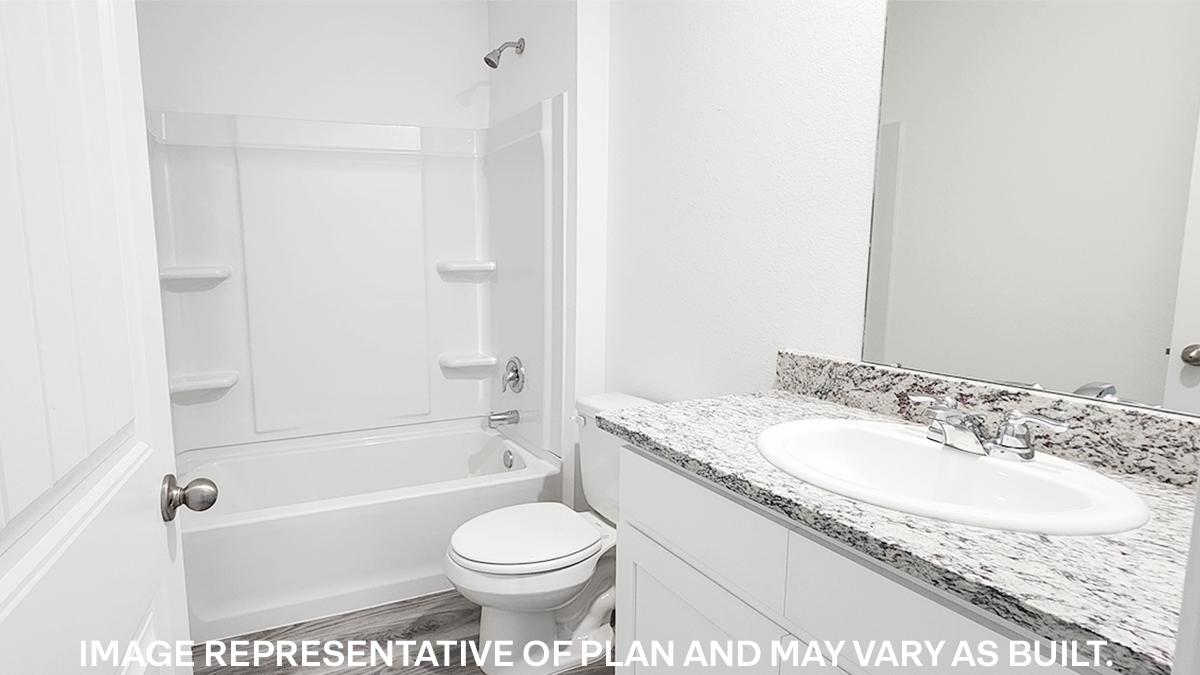 second bathroom with single vanity and toilet and shower tub combo