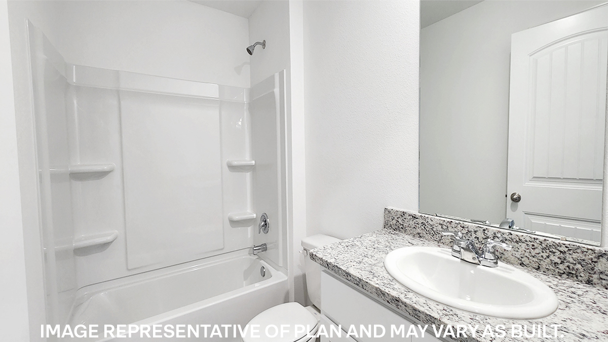 third bathroom with single vanity and toilet and shower tub combo