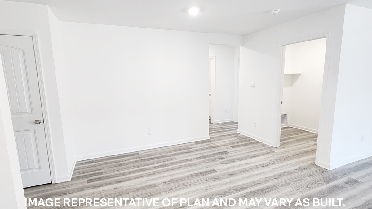 open-concept dining room with access to other bedrooms