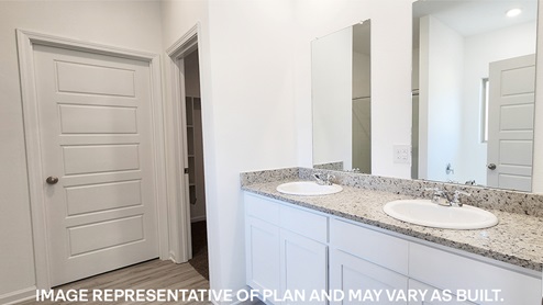 dual vanity in the primary bathroom of the cameron plan