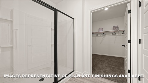 separate shower access and door to walk-in closet with space for all your things