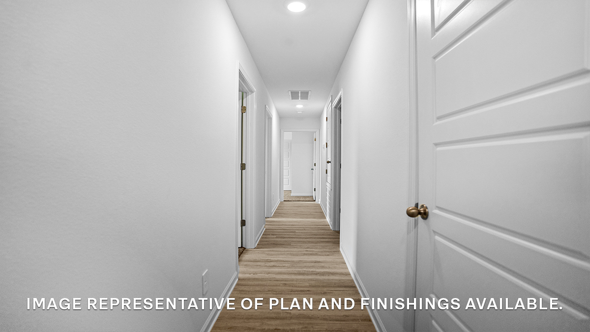 Hallway in the front of the home leading to guest bedrooms
