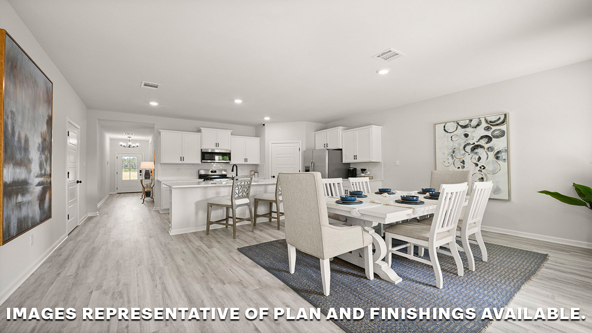 open-concept dining space with kitchen, hall and pantry