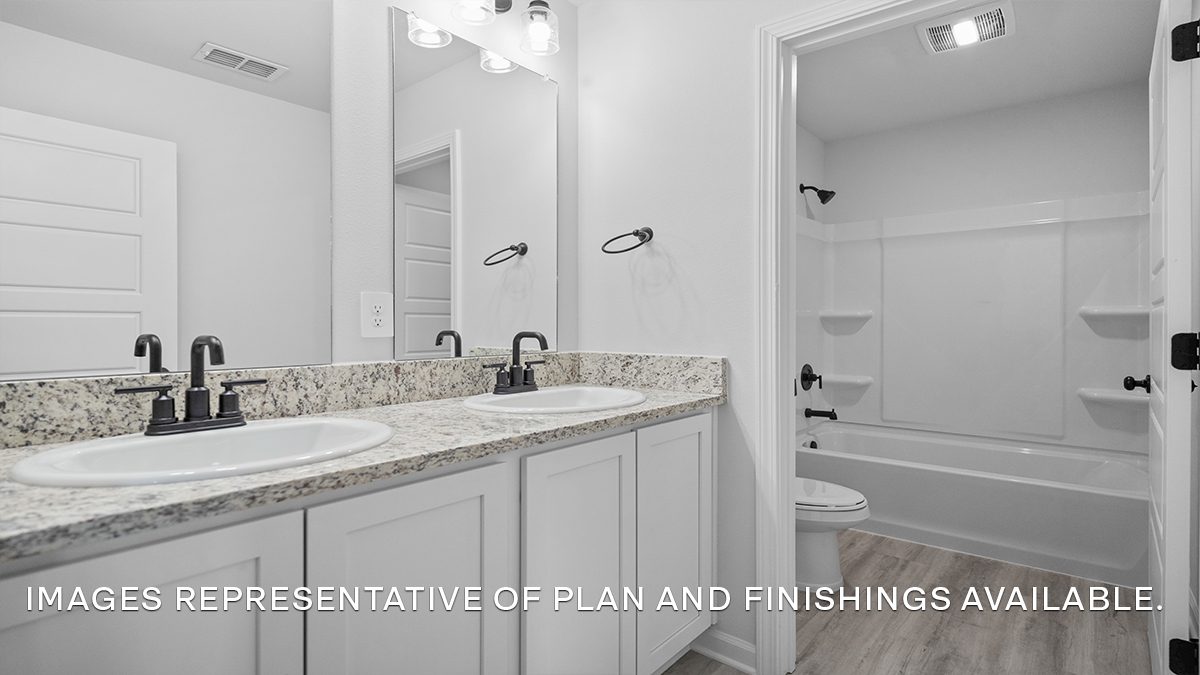 Upstairs guest bathroom with single vanity mirror and shower tub combo